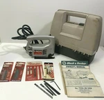 Vintage Black & Decker U-151 Electric Jigsaw W/lots Of Accessories: Works Great. Fixed Price $59.99.