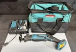 Makita XRJ01 With Charger And 15" Bag. Fixed Price $75.00.