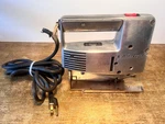 Vintage Montgomery Ward Powr-kraft Model TPC-8993A Sabre Jig Saw Aluminum. Fixed Price $25.00.