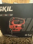 Skil JS314901 6 Amp Corded Electric Orbital Jig Saw With Halo Light And 2 Blades. Fixed Price $49.99.