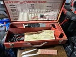 Vintage Milwaukee Sawzall With Metal Case Blades 58-12-2250 Does Not Work. Fixed Price $47.99.
