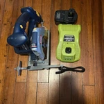 New Ryobi 18.V Cordless Electrical Saw Charger And Battery. Fixed Price $55.00.
