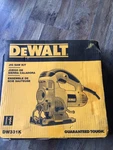 New Factory Sealed Dewalt DW331K 6.5 Amp Corded Variable Speed Jig Saw Kit. Fixed Price $125.00.