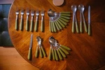 Vintage Saber Green Flatware Set - 6 Forks, Knife, Bread 21 Spoons. Fixed Price $80.00.