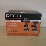 Ridgid 18V Brushless Hammer Drill And 3-SPEED Impact Driver Kit R9208. Fixed Price $134.99.