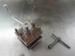 Used Jet Brand 1-1/4" Capacity Turret Type Tool Post W/ Wrench (tf). Fixed Price $150.00.