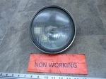 1985 Honda Shadow VT700 H452-4. Stanley Headlight And Trim Ring. Fixed Price $57.00.
