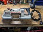 Porter Cable Porta-band 725 Two Speed Heavy Duty Portable Corded Saw. Fixed Price $109.00.