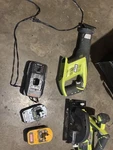 Ryobi Saw Drill 218 V Batteries One Of Them Lithium Charger & Bag. Fixed Price $300.00.