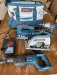 Bosch Kit Bare Tools: Circular Reciprocating Jigsaw, Hammer Drill, Bag. Fixed Price $105.00.