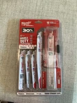 New Milwaukee Pcs (12) Sawzall Reciprocating Blade Set (metal And Wood). Fixed Price $25.99.