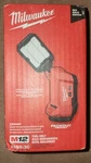 New Milwaukee M12 Rover Multi-directional Flood Light With Packout 2350-20. Fixed Price $89.99.